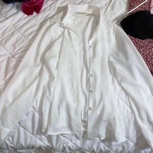 size large, white, button-down blouse, very good shape, color is still very whit
